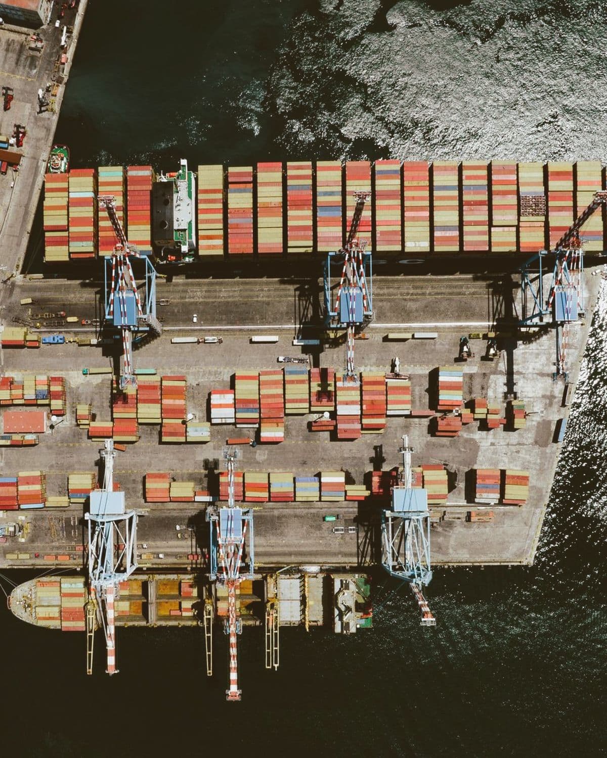 Aerial view of a vessel being worked at a container berth