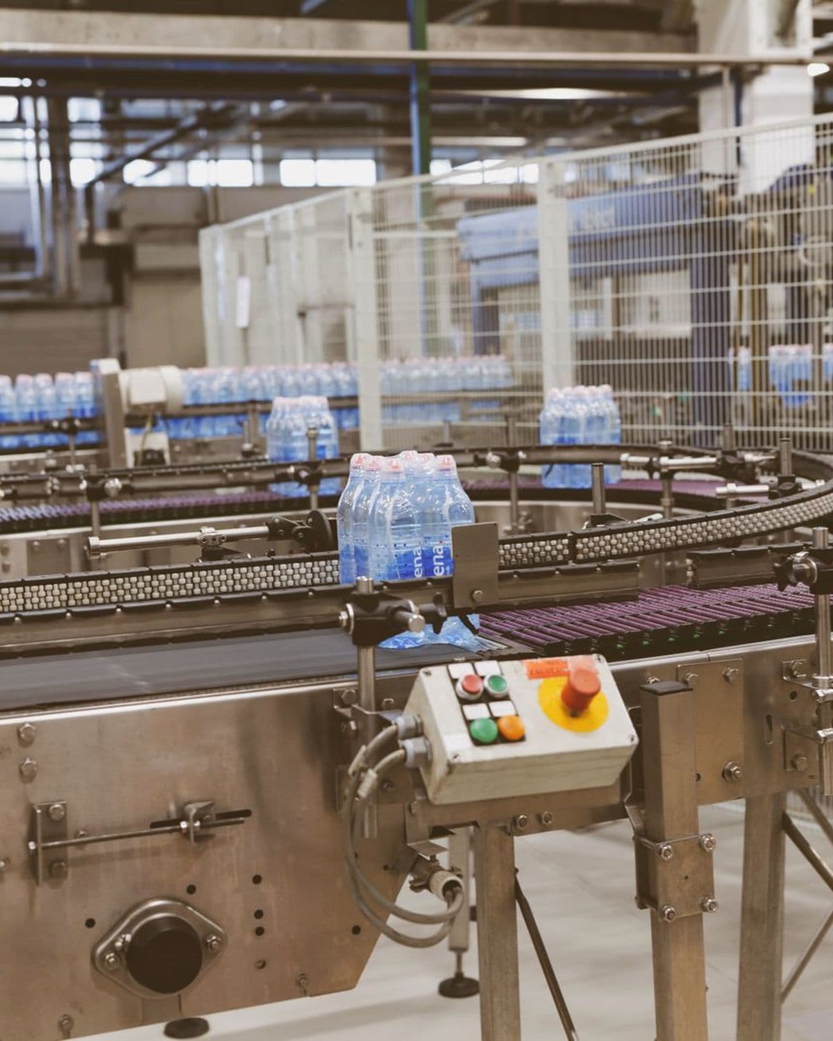 Bottling and packing line inside a food production facility