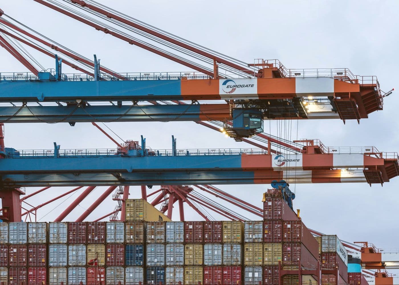 Ship-to-shore cranes above stacked containers